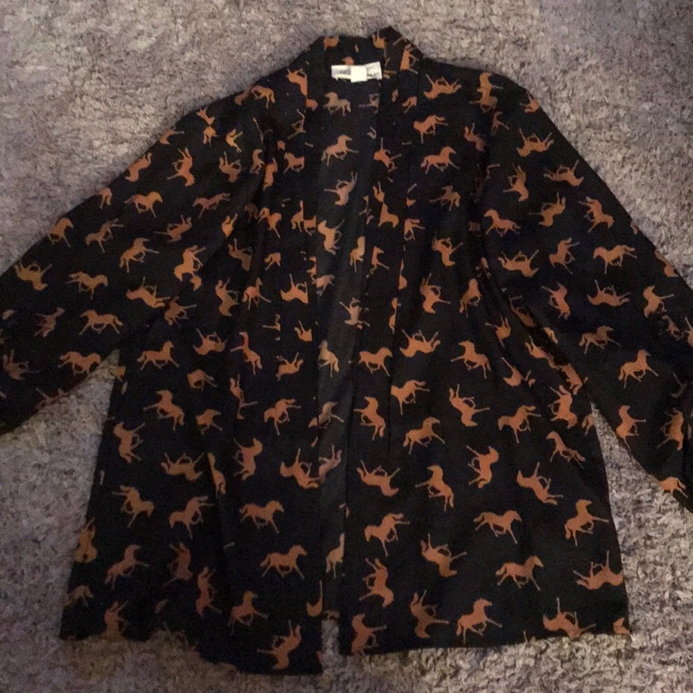 Black blazer with brown horses